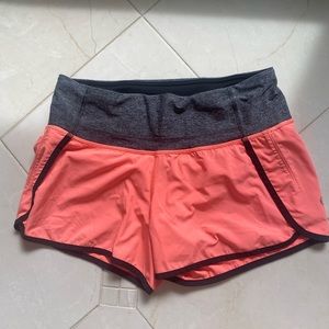 Lululemon hot pink/gray shorts.